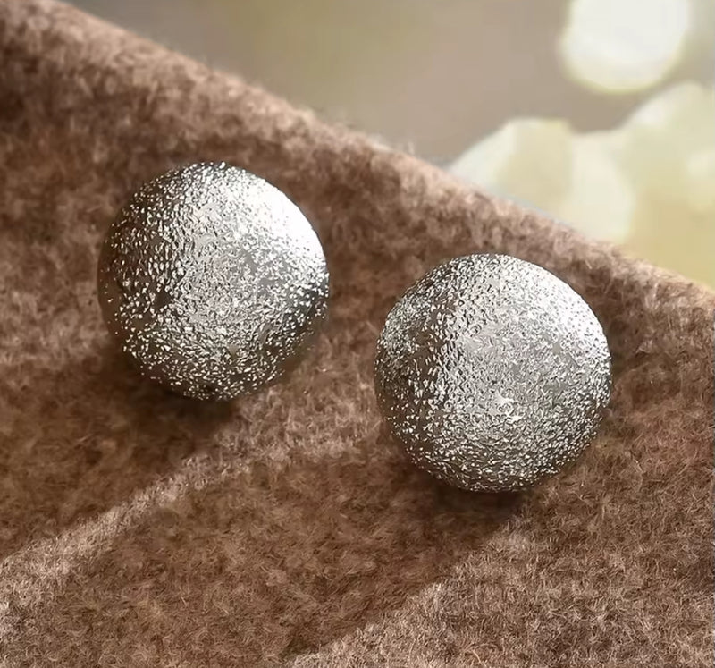 Clip on 3/4" small silver textured round scoop style earrings