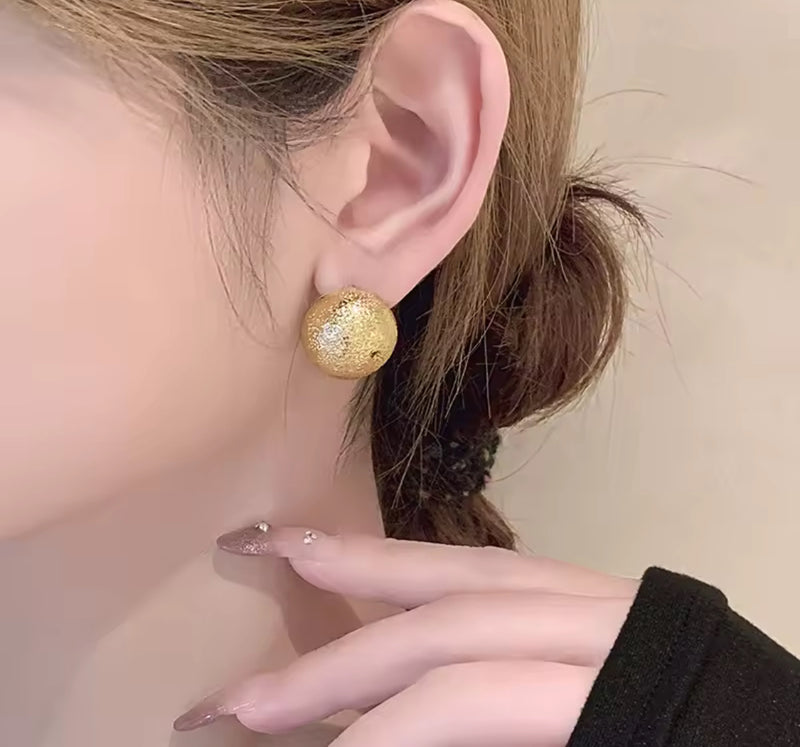 Clip on 3/4" small gold textured round scoop style earrings