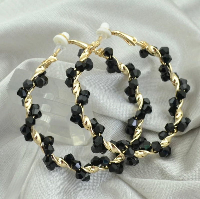 Clip on 2 1/4" gold and twisted shiny black bead hoop earrings