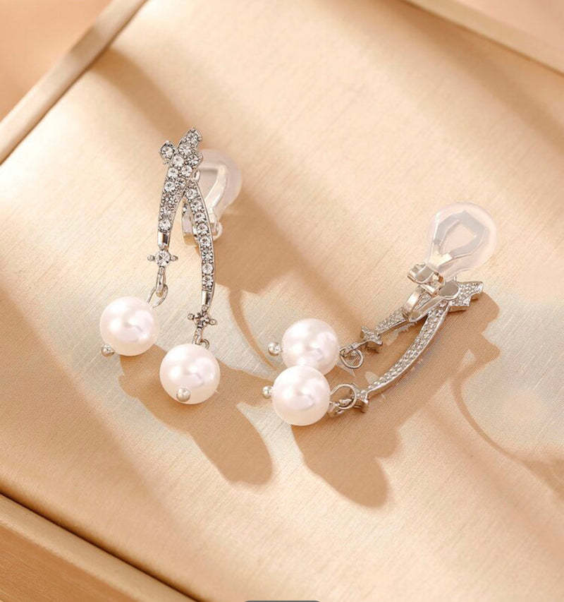 Clip on 1 3/4" silver clear stone stick earrings with white pearl earrings