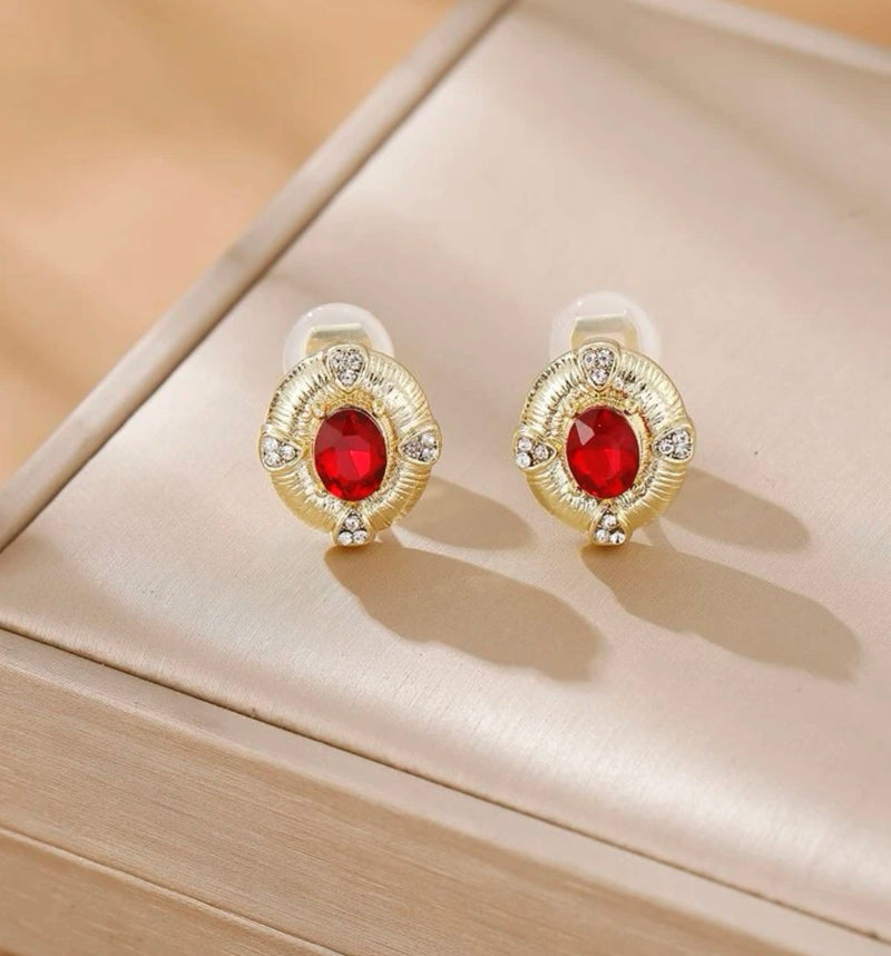 Clip on 3/4" small gold clear and red stone oval earrings