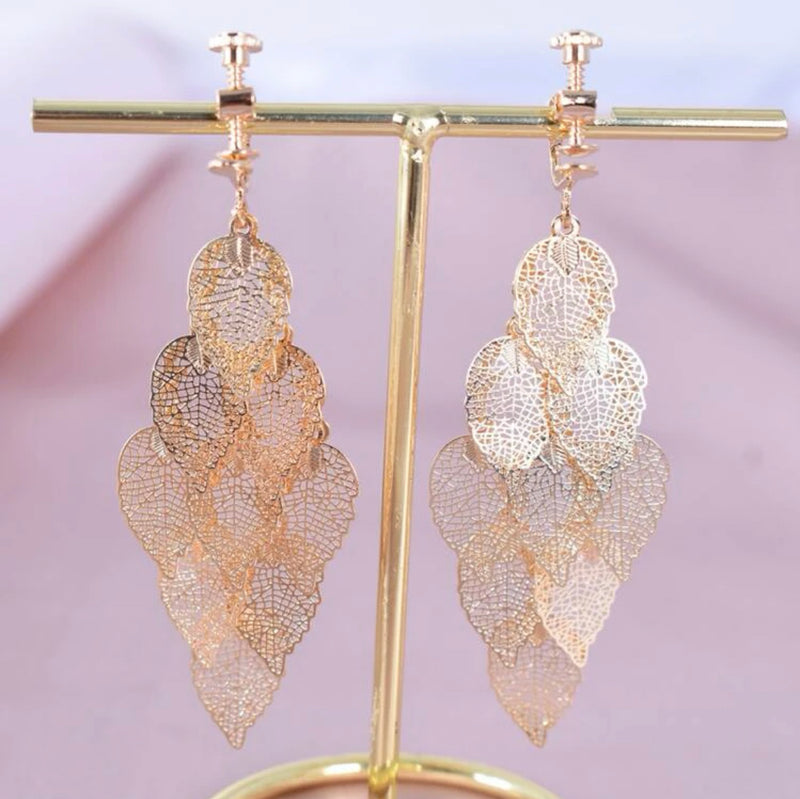 Clip on 2 3/4" gold pinhole layered dangle leaf earrings