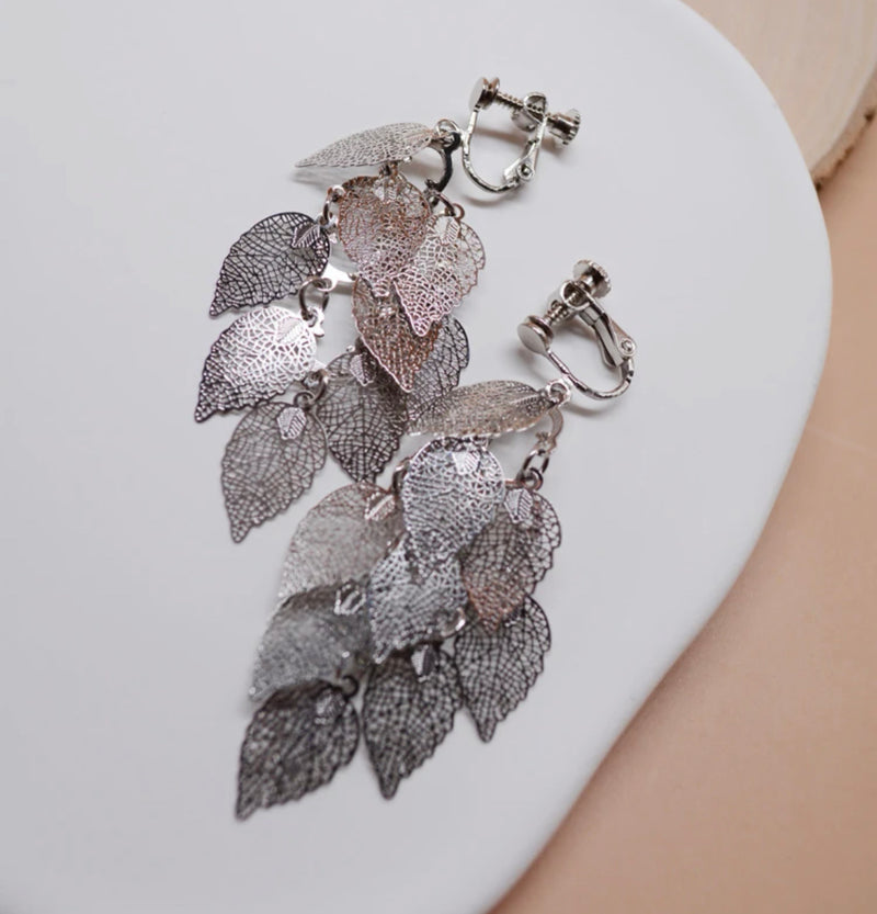 Clip on 2 3/4" silver pinhole layered dangle leaf earrings