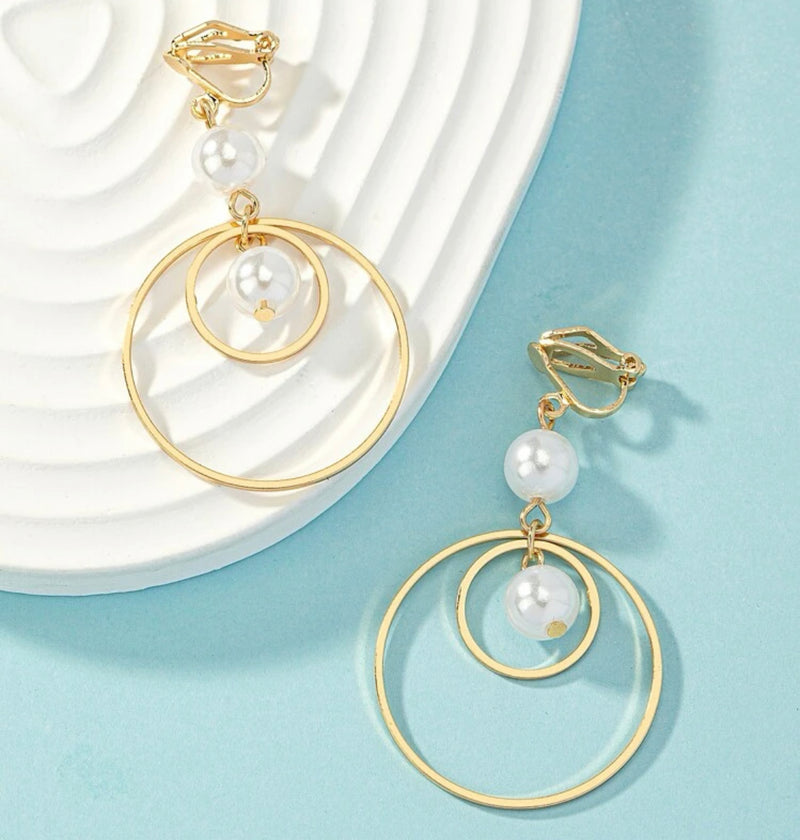 Clip on 2 1/4" gold double hoop dangle earrings with white pearls