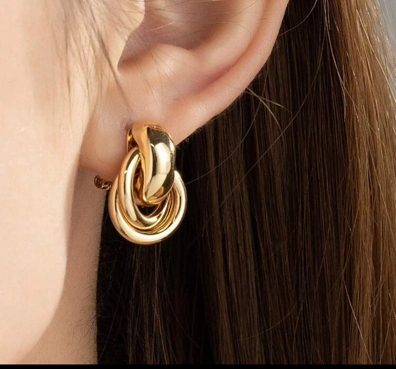 Clip on 3/4" shiny gold knot button style earrings