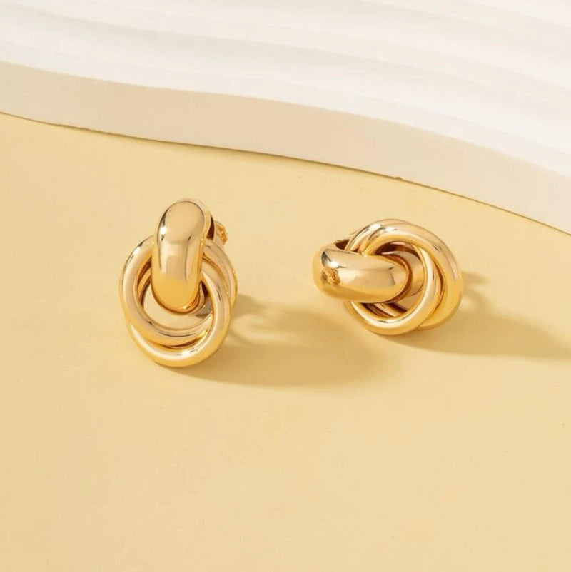 Clip on 3/4" shiny gold knot button style earrings