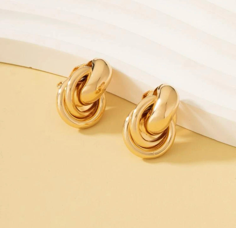 Clip on 3/4" shiny gold knot button style earrings