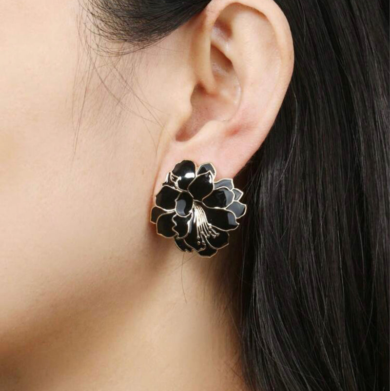 Clip on 1 1/4" gold and black button style flower earrings