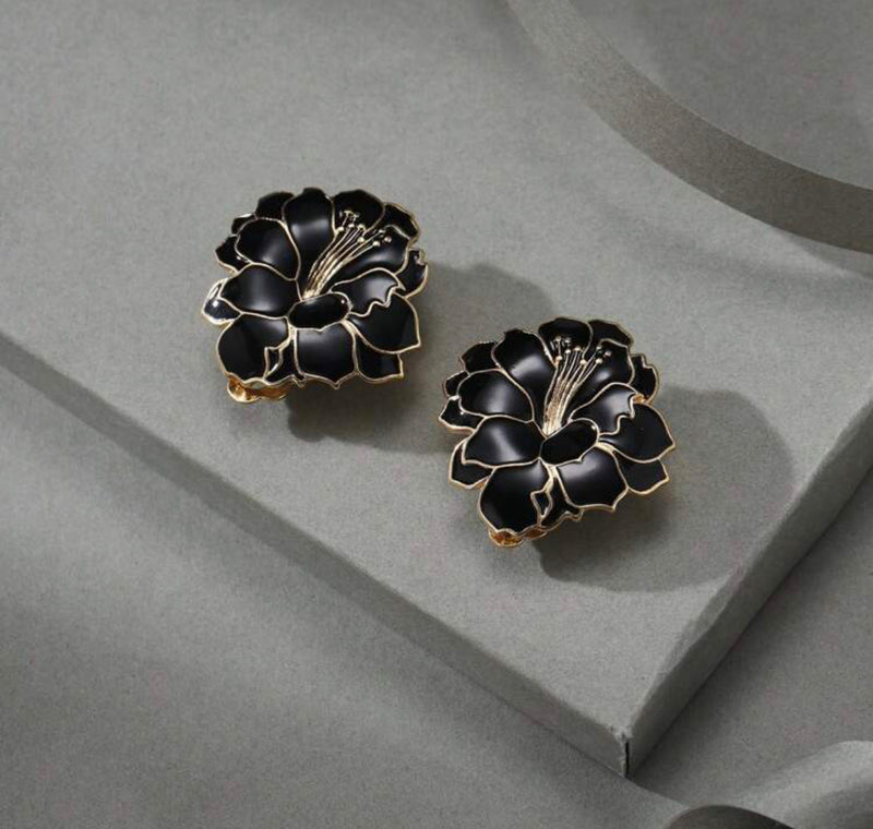 Clip on 1 1/4" gold and black button style flower earrings