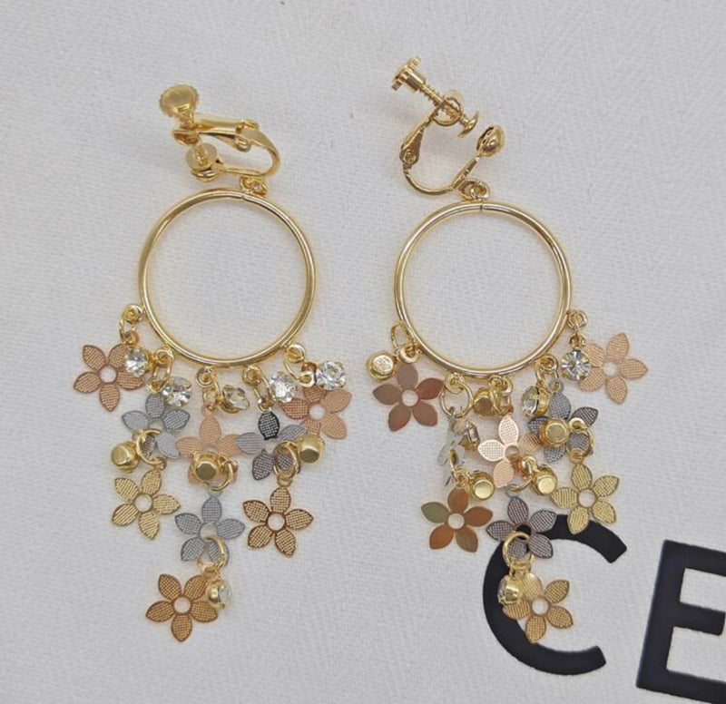 Clip on gold hoop earrings w/clear stones and gold, rose, silver flowers