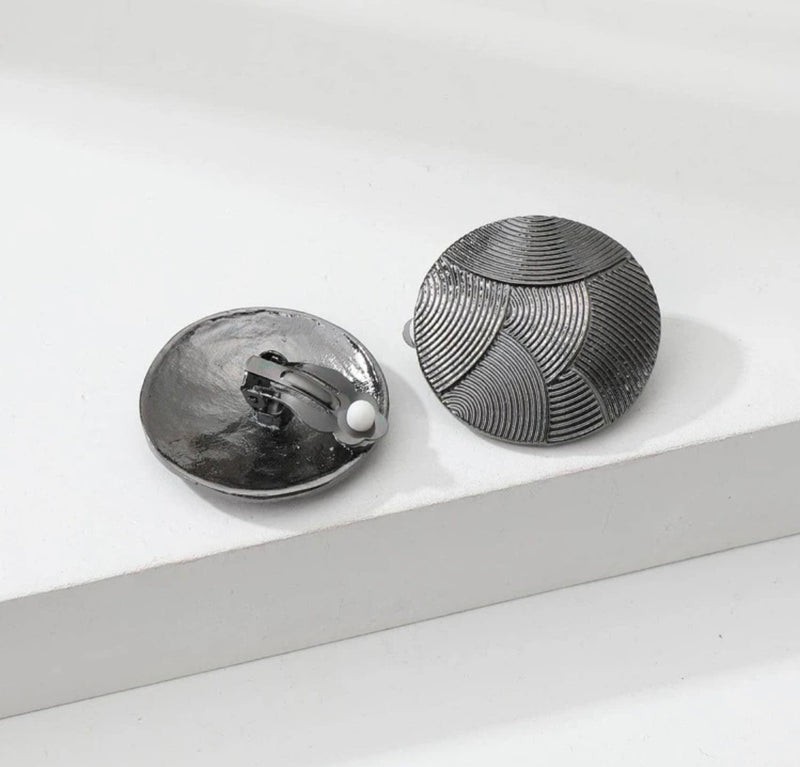 Clip on 1 1/2" gunmetal textured round button style earrings