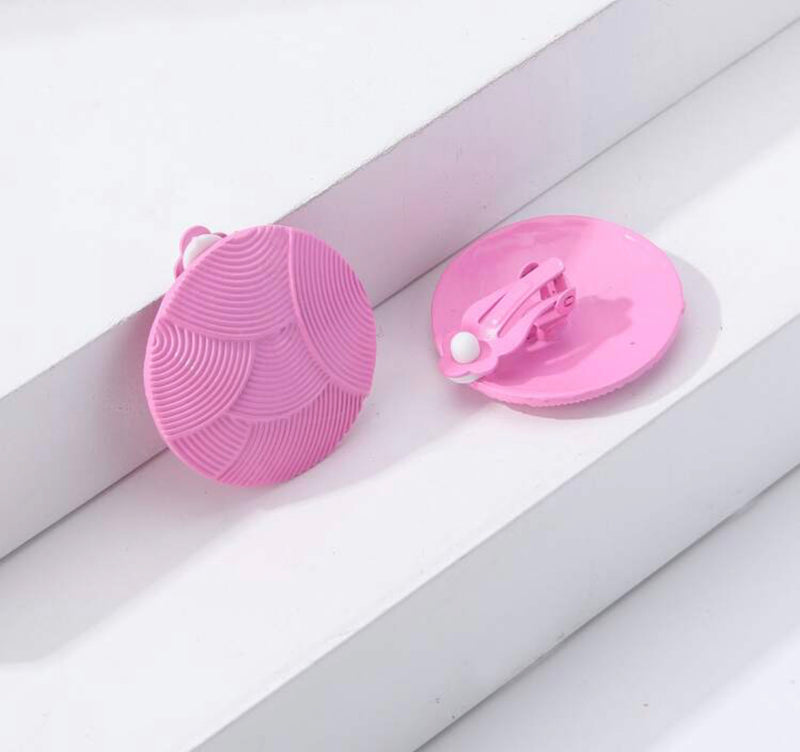 Clip on 1 1/2" pink textured round button style earrings