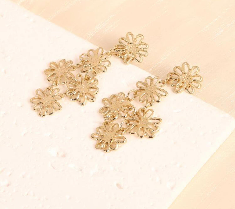 Clip on 2 1/4" gold dangle cutout multi flower earrings