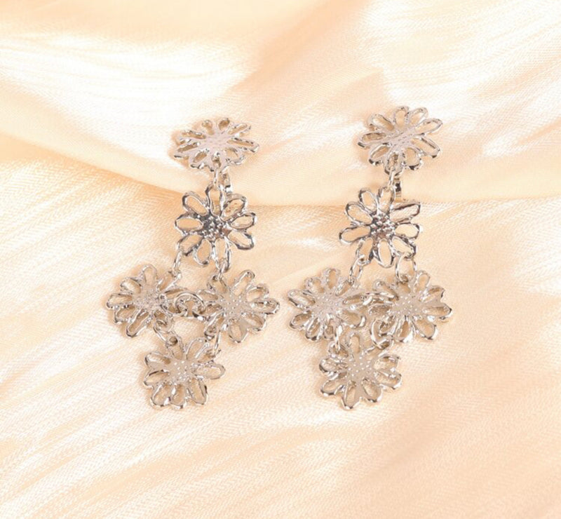 Clip on 2 1/4"silver dangle cutout multi flower earrings