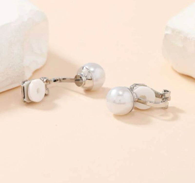 Clip on 1/2" silver and .03 cream pearl round button style earrings