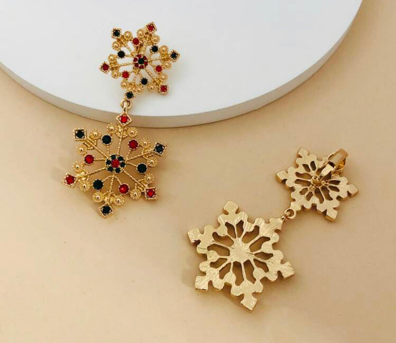 Clip on 2 3/4" long gold textured double snowflake earrings w/green & red stones