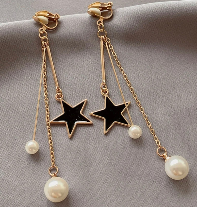 Clip on 3 1/2" gold chain, white pearl and black star dangle earrings