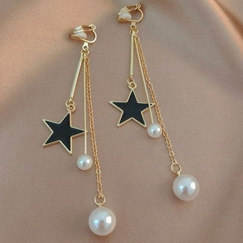 Clip on 3 1/2" gold chain, white pearl and black star dangle earrings