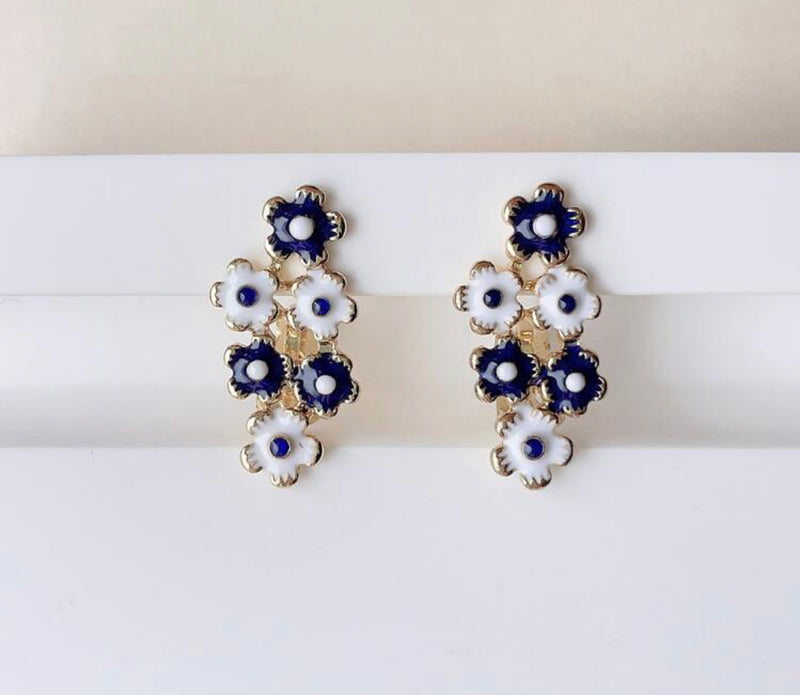 Clip on 1" gold, white and blue flower button style earrings