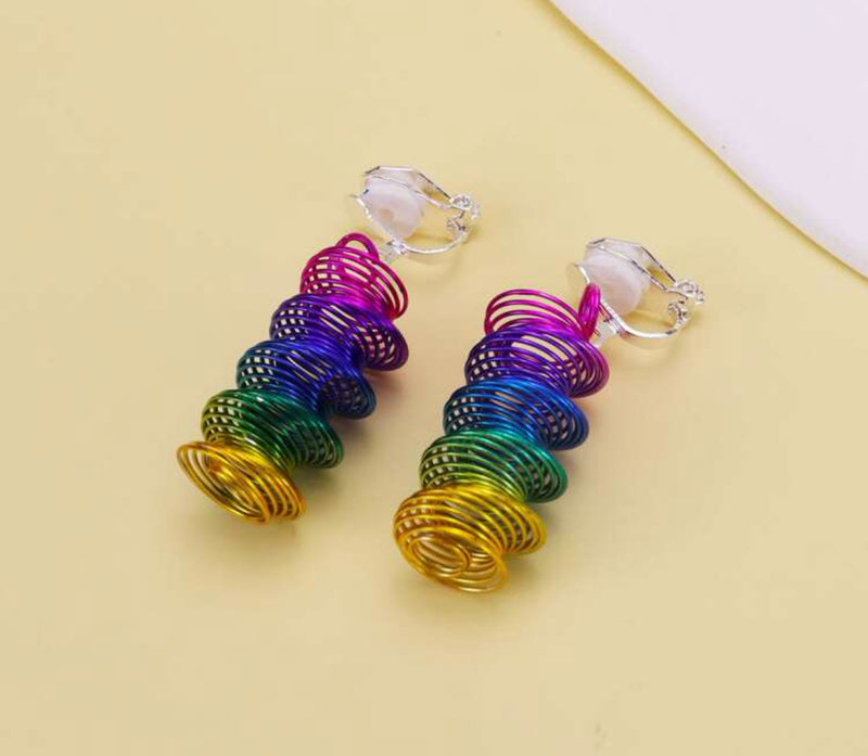 Clip on 1 1/2" silver, pink, blue multi colored coil dangle earrings