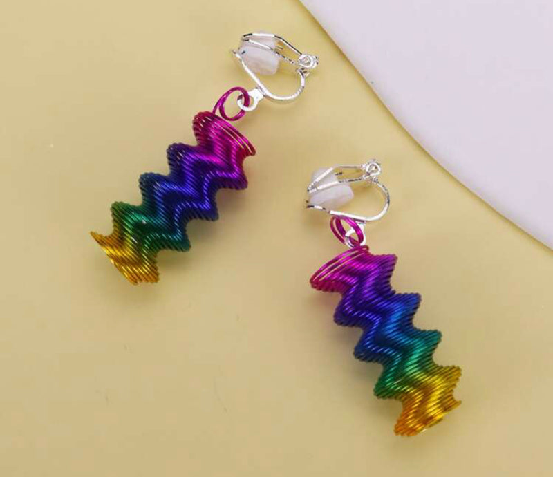 Clip on 1 1/2" silver, pink, blue multi colored coil dangle earrings