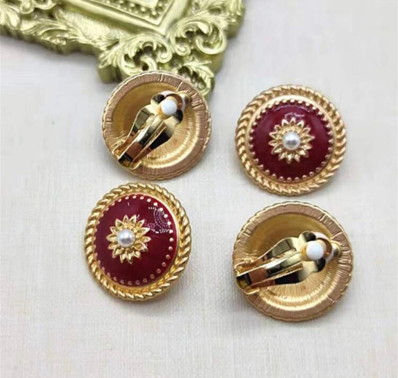 Vintage clip on 1" matte gold and burgundy round earrings with center pearl