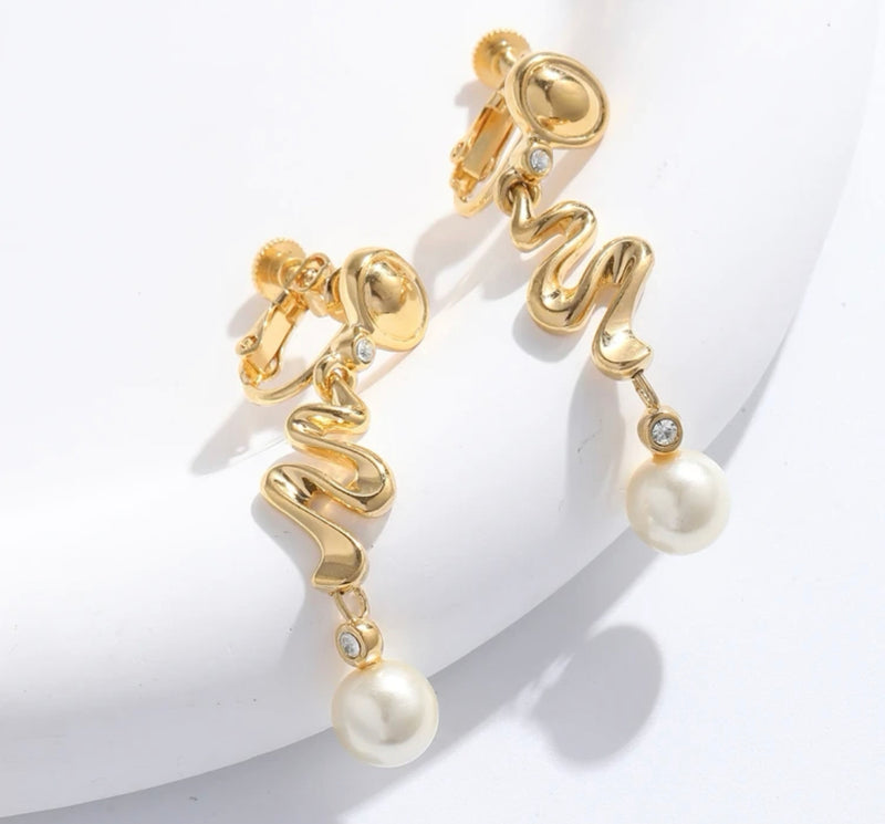 Clip on 1 3/4" gold zig zag earrings with dangle clear stone and pearl