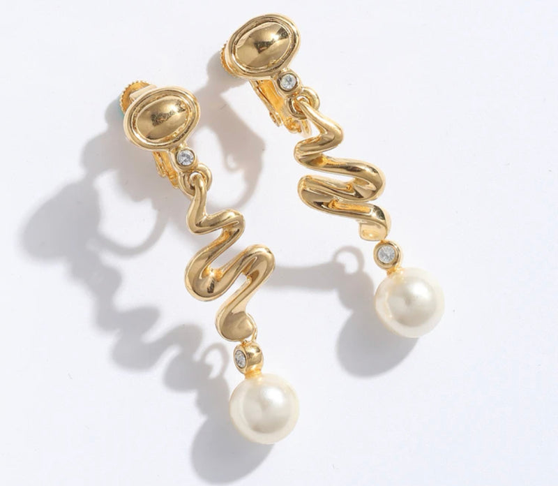 Clip on 1 1/2" gold, white pearl earrings with clear stone edges