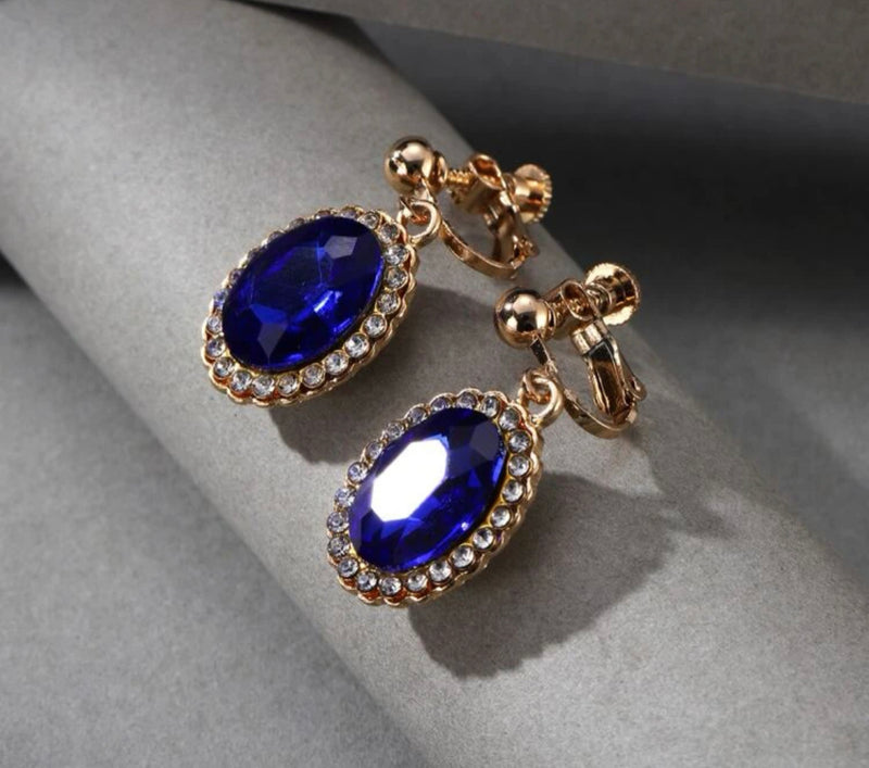 Clip on 1 1/4" gold, blue and clear stone dangle earrings