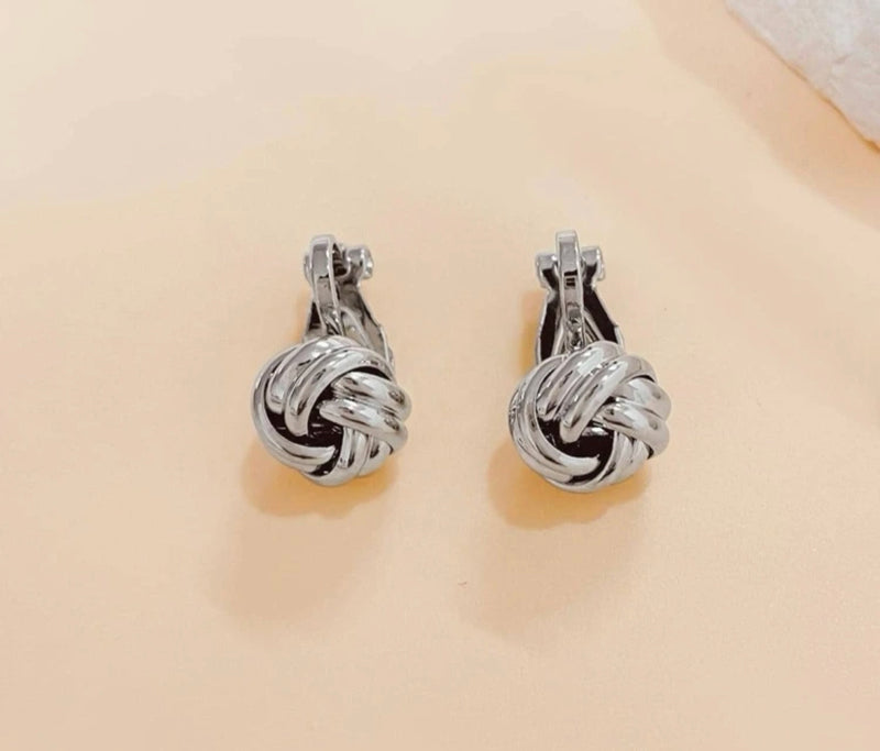 Clip on 3/4" small silver knot button style earrings