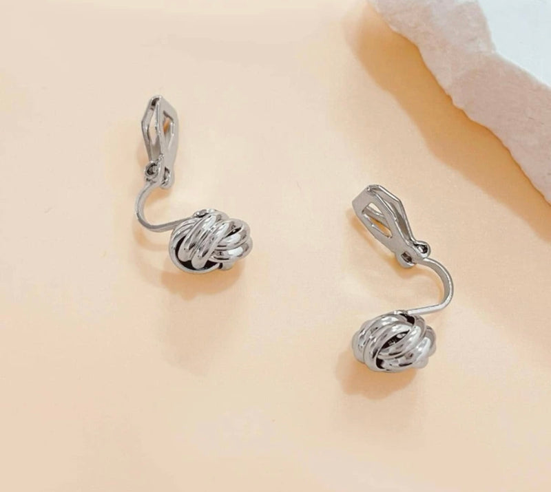 Clip on 3/4" small silver knot button style earrings