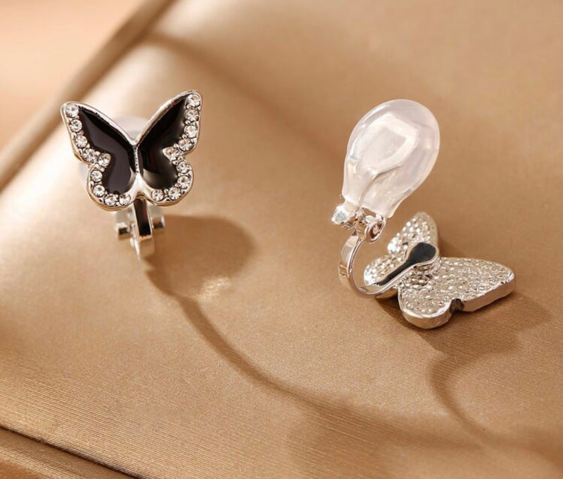 Clip on 1/2" silver, black and clear stone button style butterfly earrings