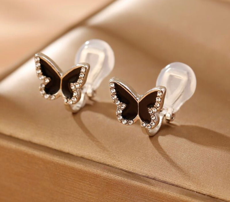 Clip on 1/2" silver, black and clear stone button style butterfly earrings