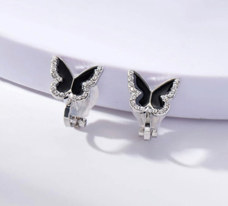 Clip on 1/2" silver, black and clear stone button style butterfly earrings