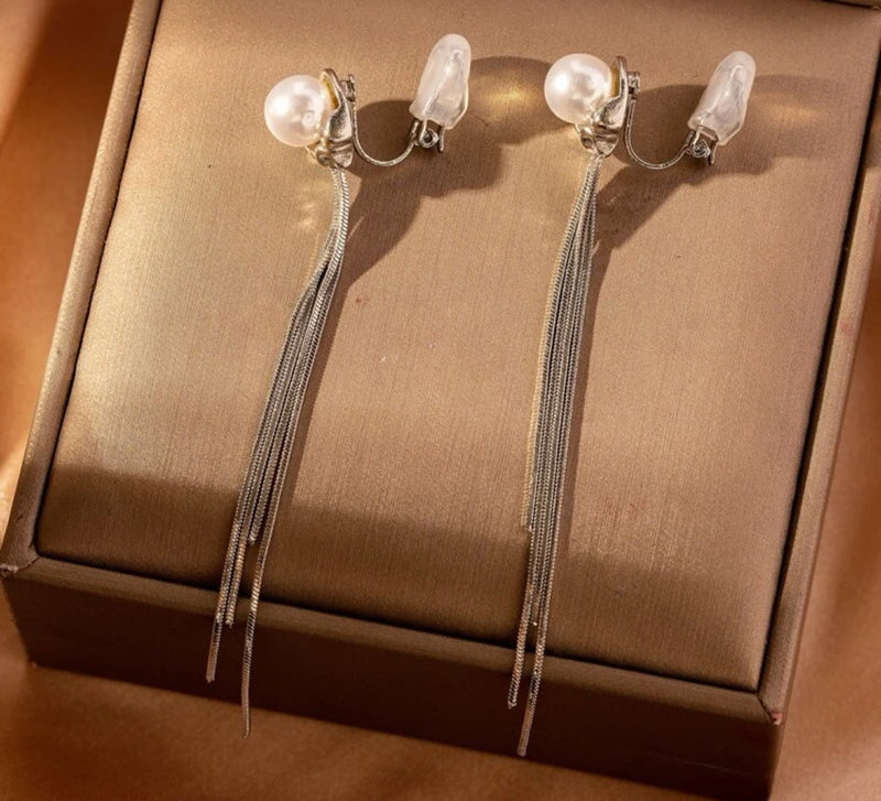 Clip on 3 1/4" silver & white pearl earrings with multi dangle snake chains