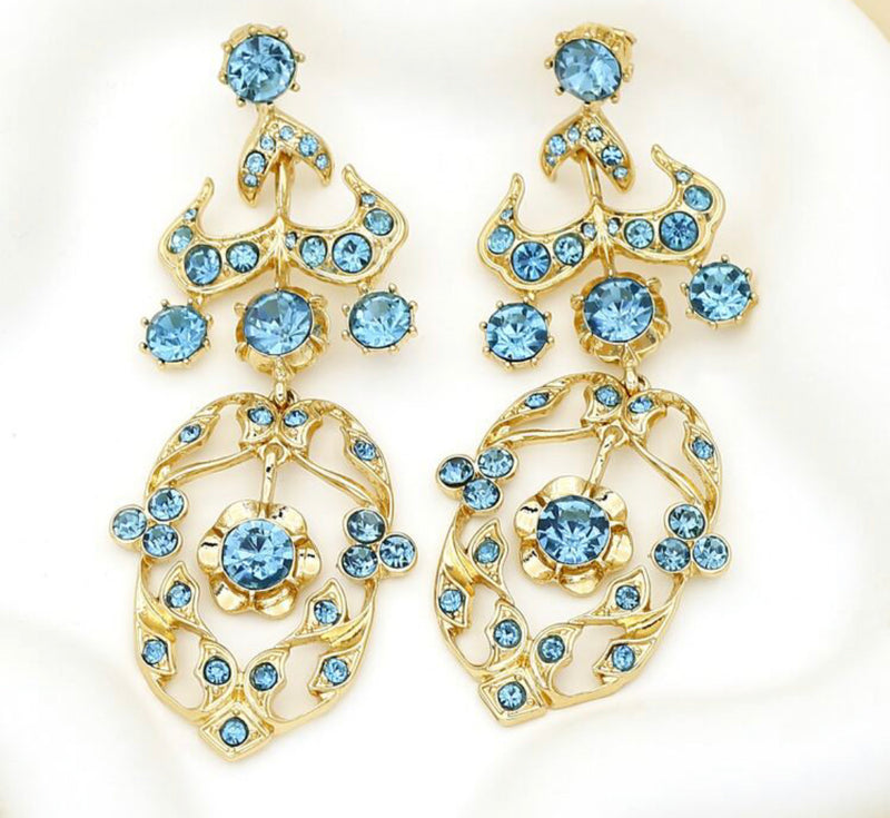 Clip on 3 3/4" long gold cutout turquoise stone dangle earrings