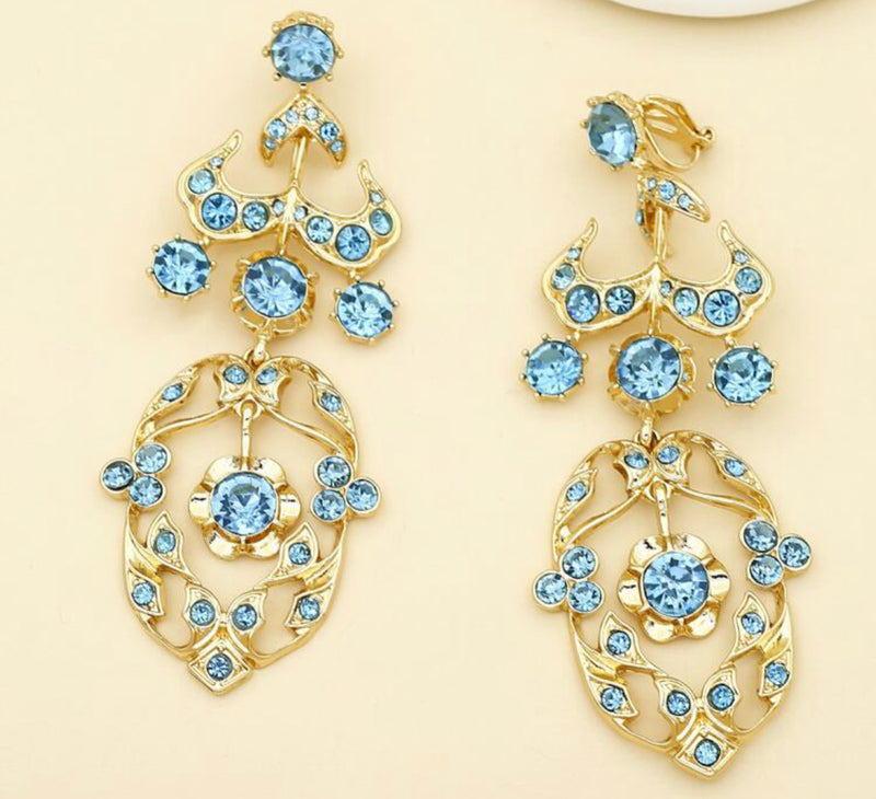 Clip on 3 3/4" long gold cutout turquoise stone dangle earrings