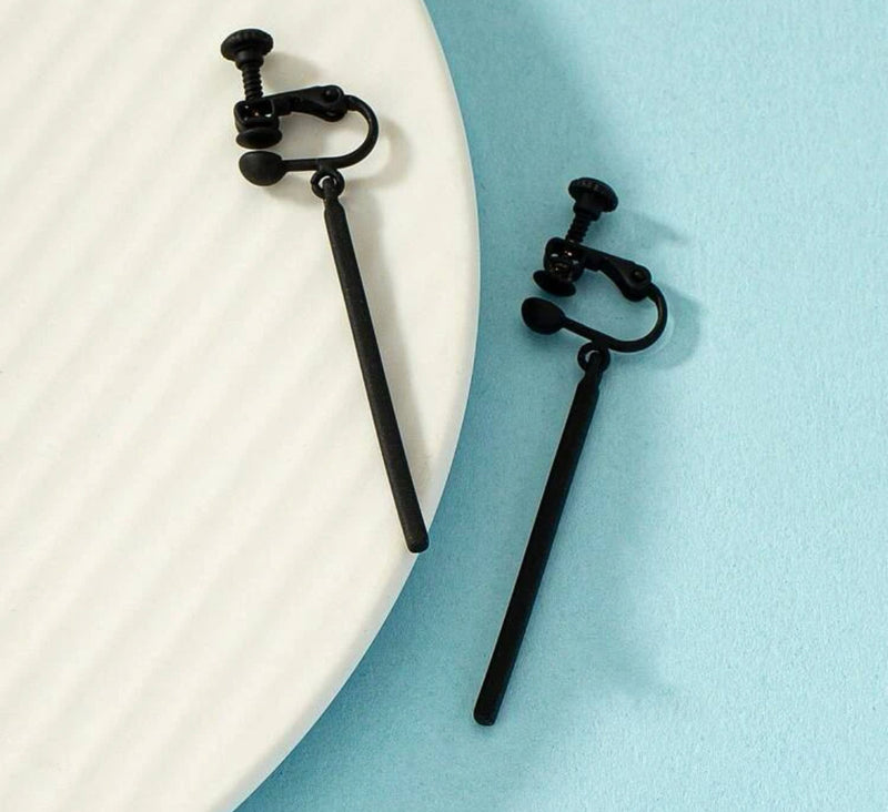 Clip on 2" black long stick style dangle earrings