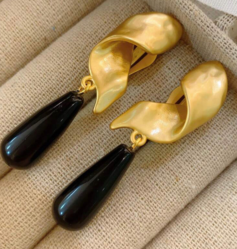 Vintage 2 1/4" clip on matte gold twisted top earrings with black bead