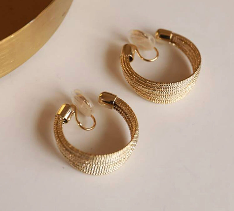 Trendy 1 1/4" clip on shiny gold hoop earring