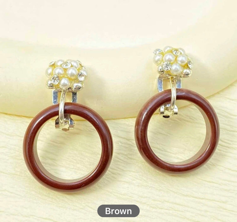 Trendy 1 1/4" clip on shiny gold hoop earring