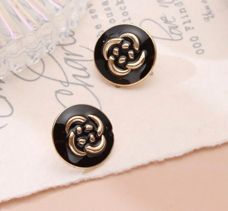 Clip on 1" gold and black flower print button style earrings