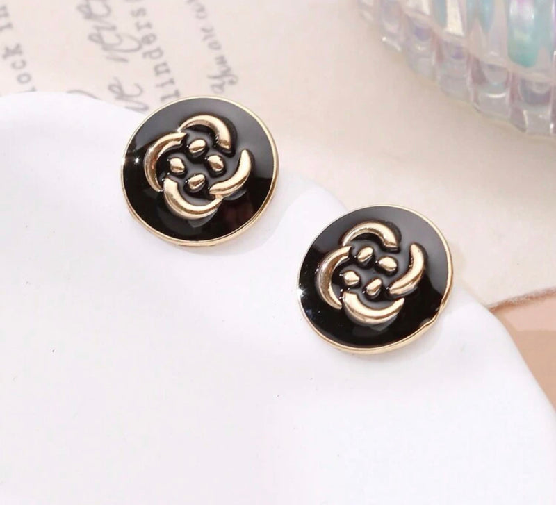 Clip on 1" gold and black flower print button style earrings