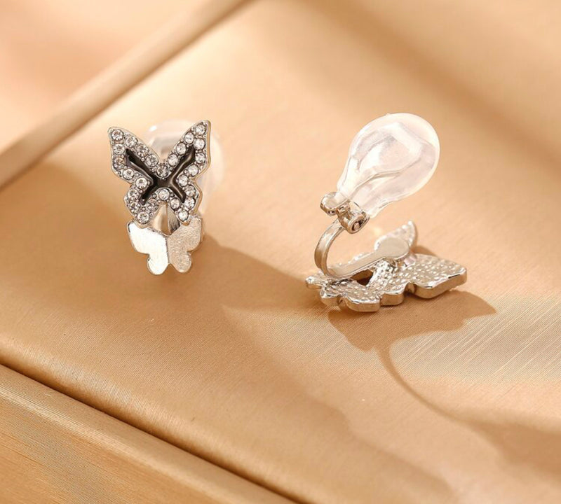 Clip on 1/2" silver, black and clear stone and double butterfly earrings