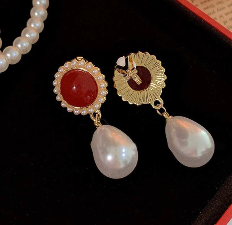 Clip on 1 3/4" gold, burgundy stone earrings with dangle pearl