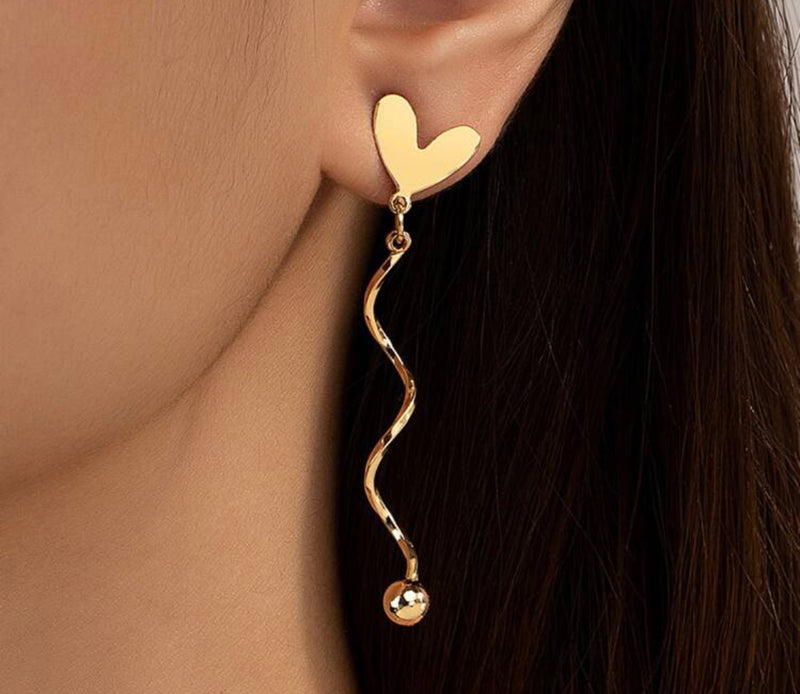 Clip on 2 1/4" gold heart earrings with dangle twisted wire