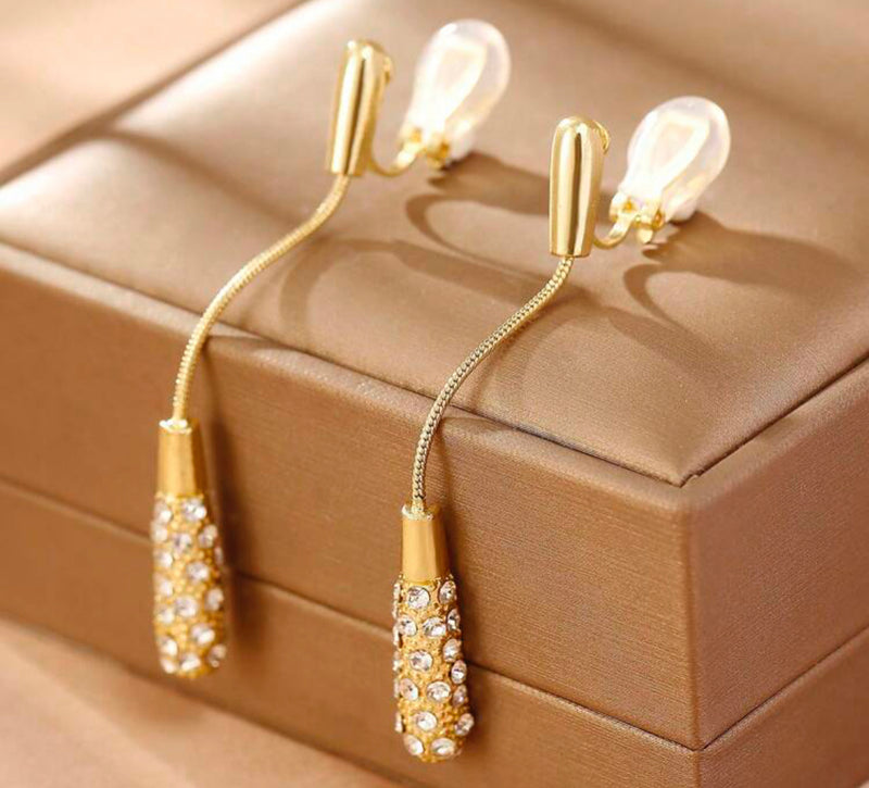 Clip on 2 3/4" gold and white clear bead dangle earrings