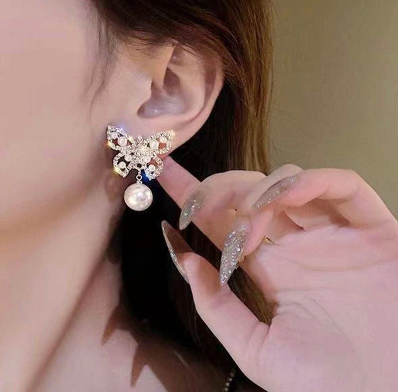 Pierced 1" gold and clear stone butterfly earrings w/dangle pearl