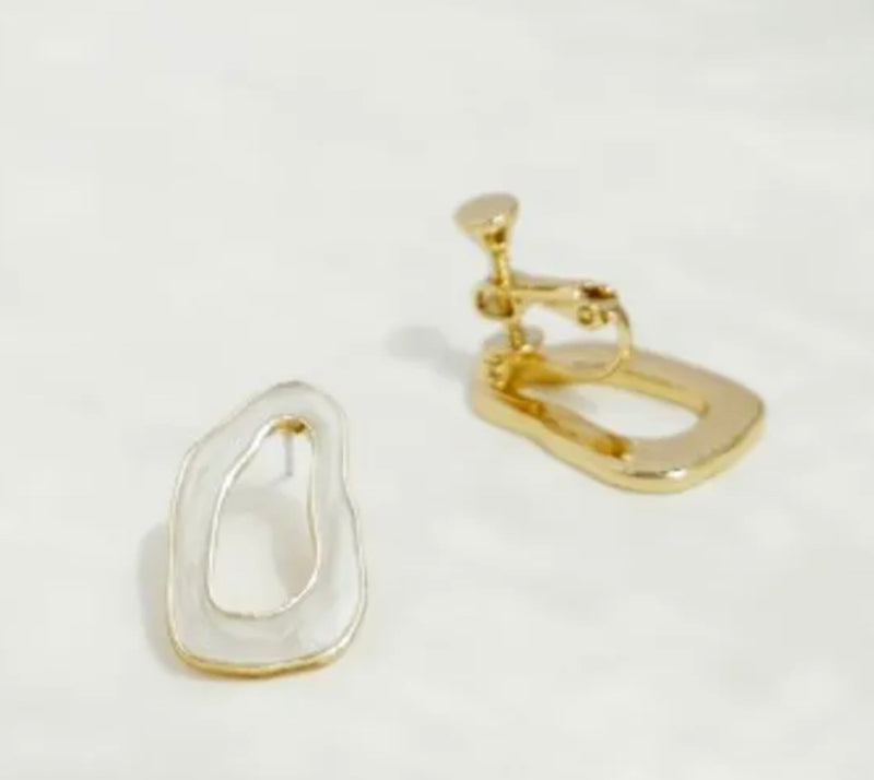 Clip on 1" gold and white odd shaped screw back earrings