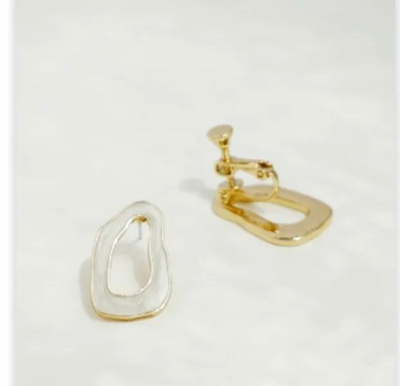 Clip on 1" gold and white odd shaped screw back earrings